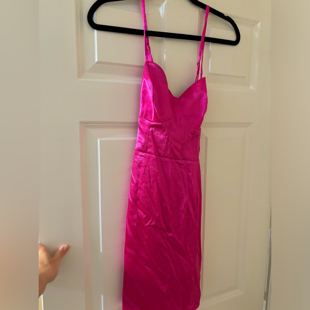 Never worn but washed. Hot pink.